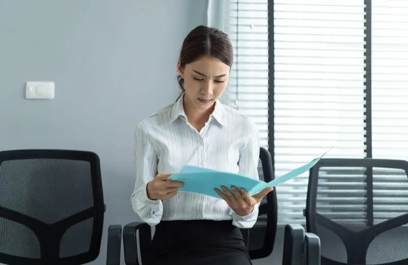 Asian beautiful woman applicant sit on lined up chair, prepare for job interview in corporate